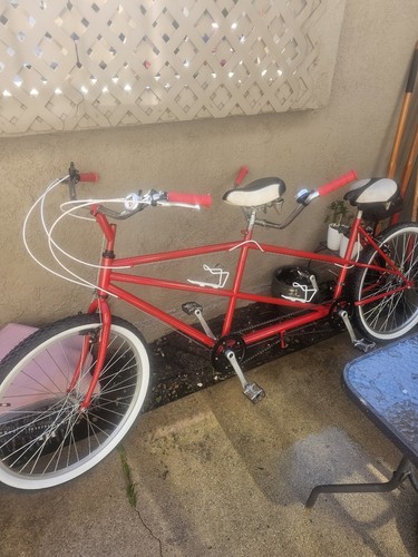 Tandem bicycle almost all new - almost,